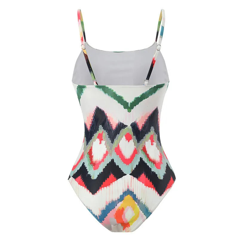 Women's two-piece beach swimsuit set with matching hip skirt in striped pattern