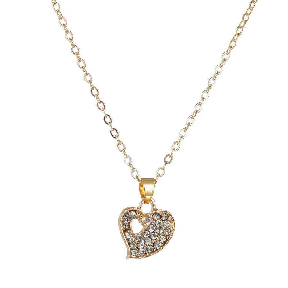 Gold electroplated love jewellery set with adjustable pendant, earrings, and hand decorations for women