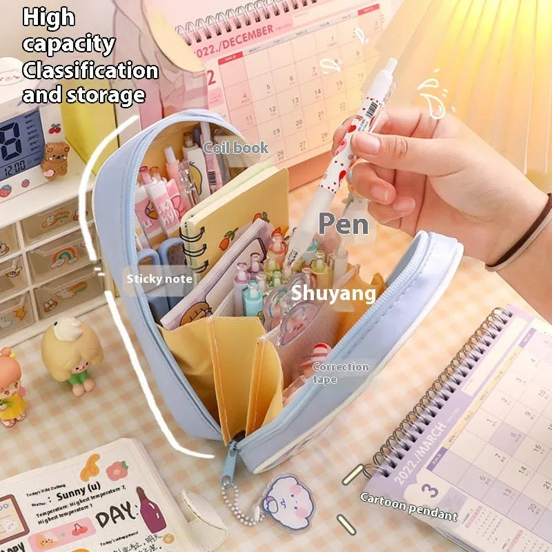 Transparent PVC pencil case with cartoon design options including caramel bear, pink floral rabbit, and water blue happy dog patterns