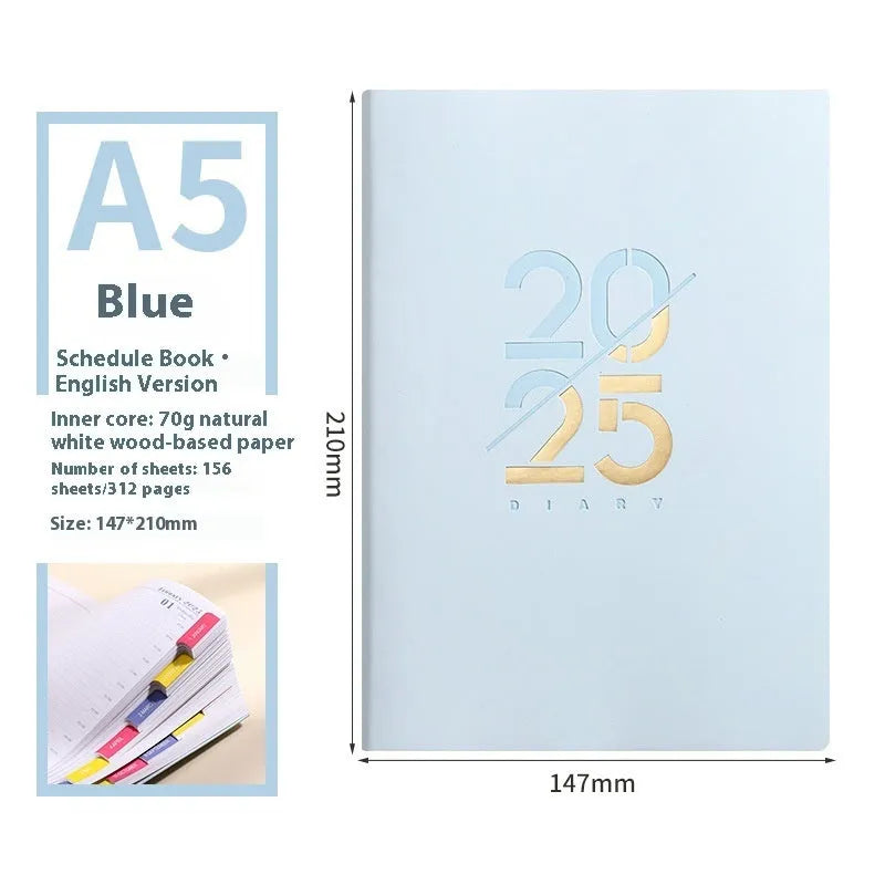 Soft cover A5 daily planner schedule book in blue, showing lay-flat binding and faux leather texture.