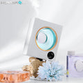 Small white wall mounted automatic aromatherapy machine with USB charging port