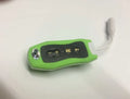 Compact black Bluetooth MP3 headset with USB cable, shown next to scale for size.