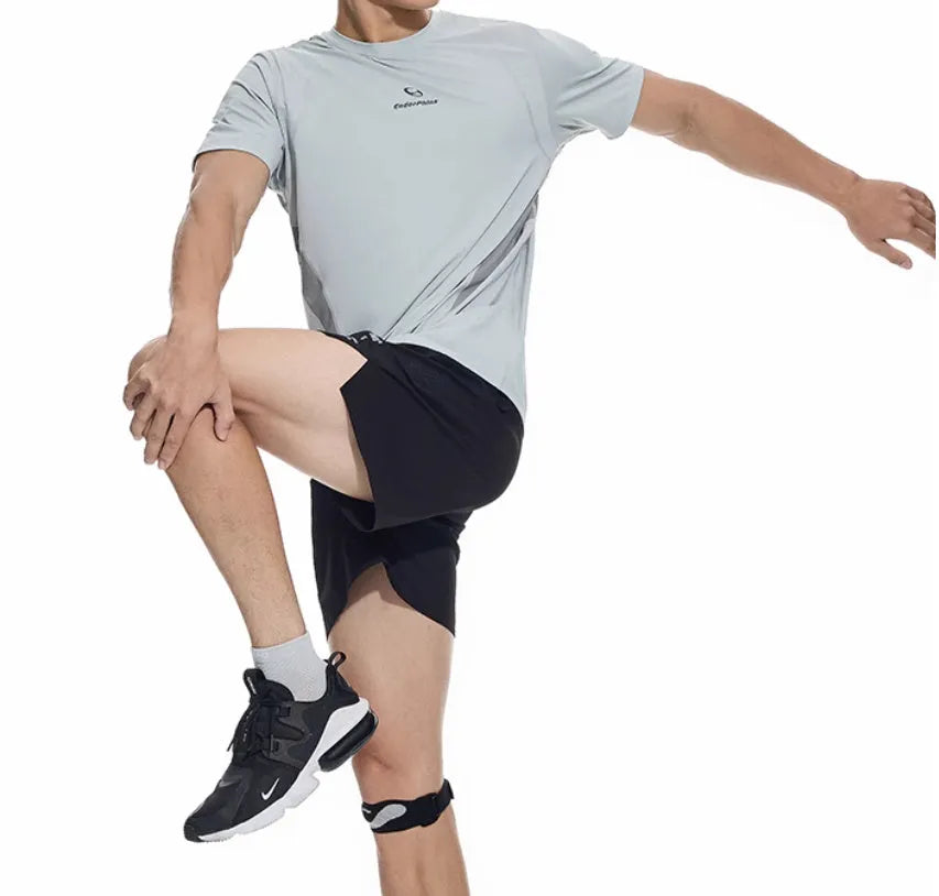 Laser-stitched black running shorts with stretch Spandex fabric laid flat.