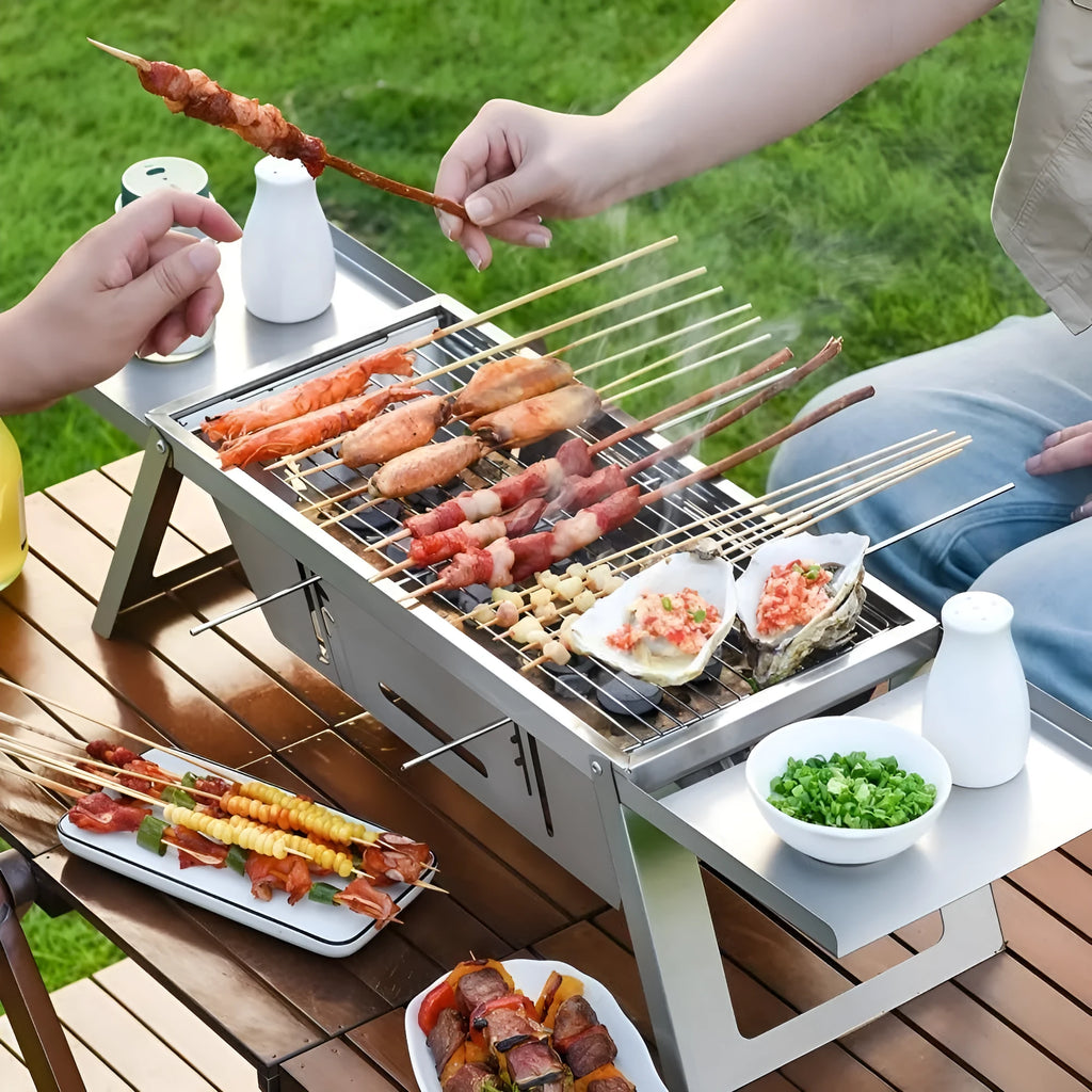 Small foldable portable charcoal grill for outdoor cooking and camping