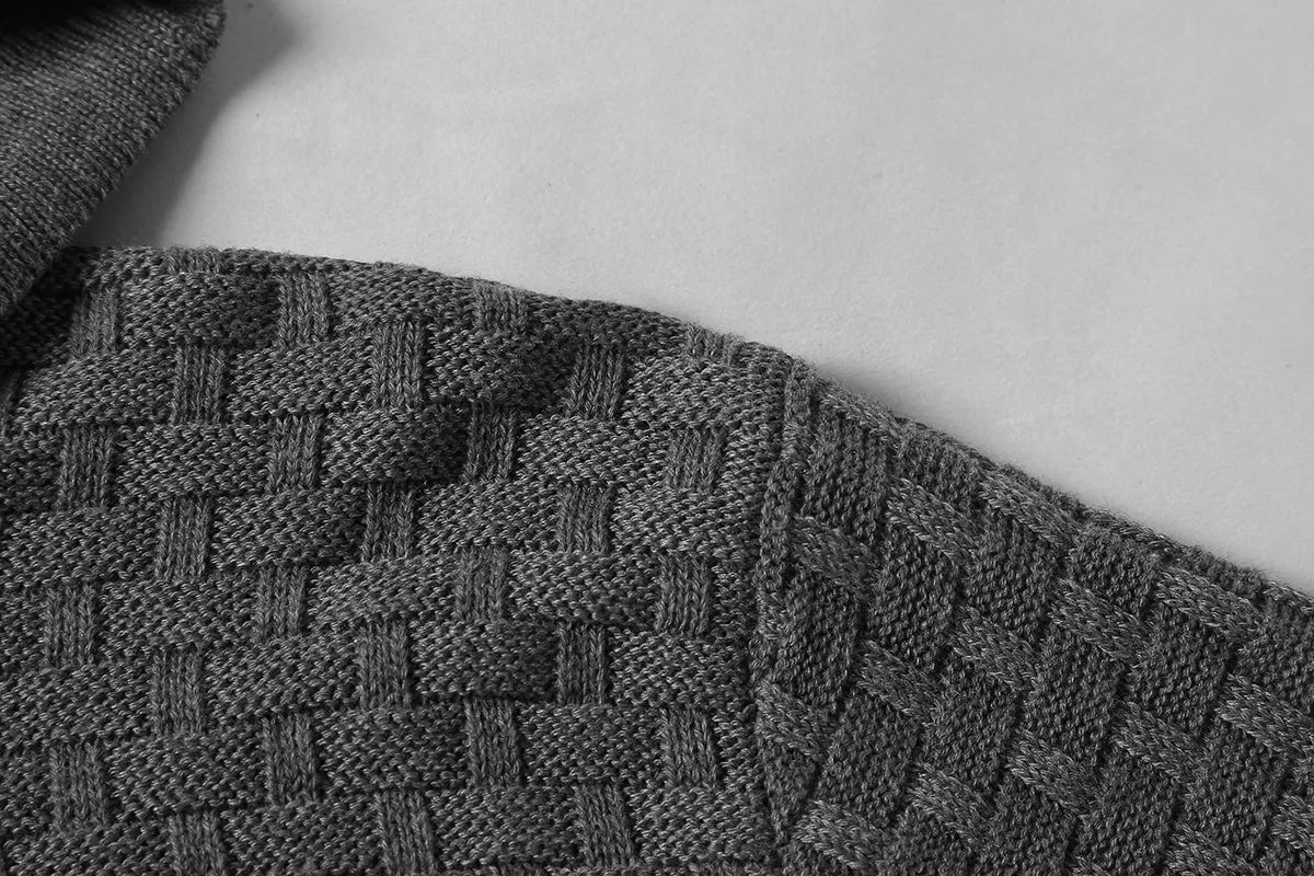 Man wearing a grey cotton-polyester blend hooded sweatshirt, showcasing the casual hoodie design.