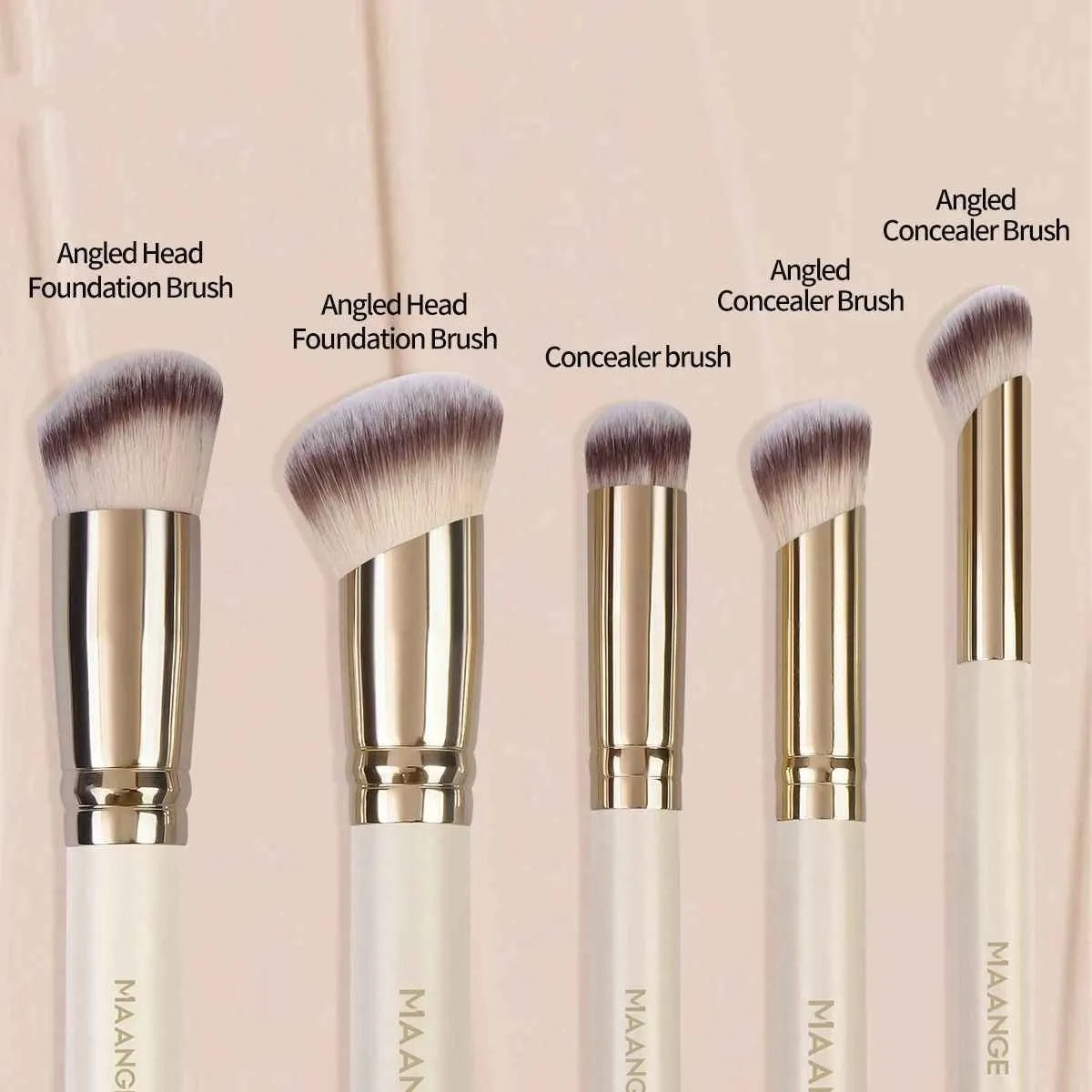 Five angled apricot-coloured makeup brushes for powder blush and foundation application
