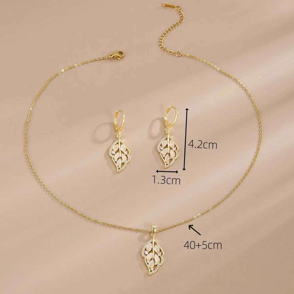 Opal leaves copper electroplated necklace and earrings set on display