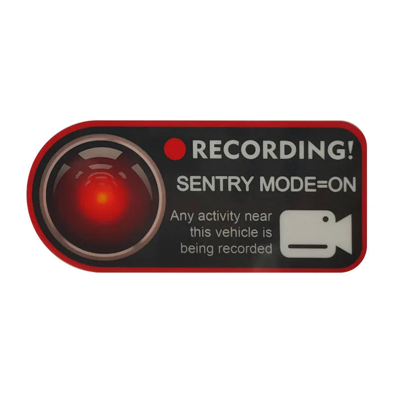 A pair of white and red electrostatic warning stickers for Tesla car windows measuring 11 by 5 cm.