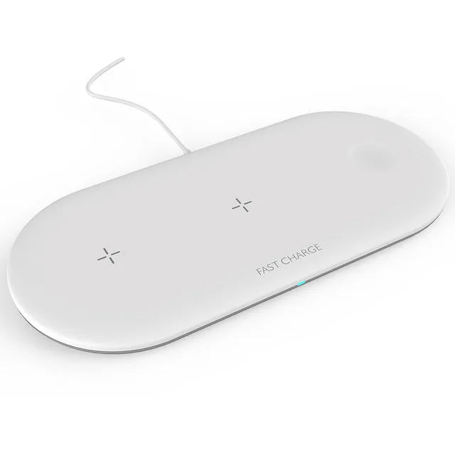 Black and white third-party wireless charging station for Apple iPhone, Watch, and AirPods on a desk.