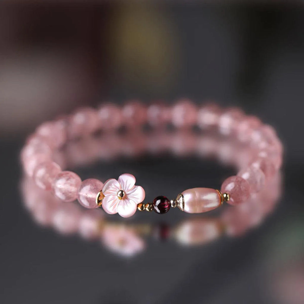 Strawberry quartz peach blossom bracelet with crystal flower design and adjustable fastening