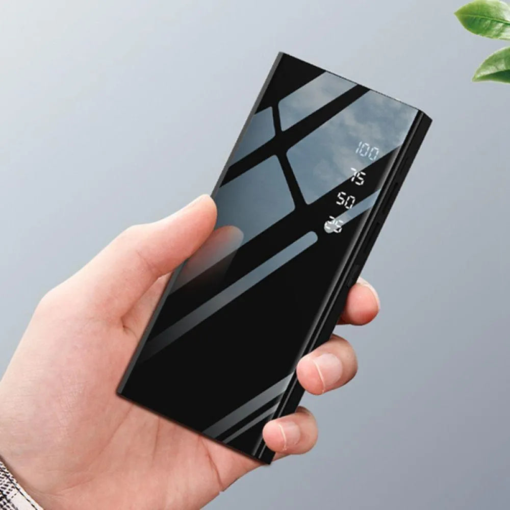 20000mAh portable power bank with LCD screen, dual USB ports, and LED torch in black, red, or white.