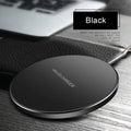 Black square GY-68 ultra-thin wireless fast charging pad on a desk.