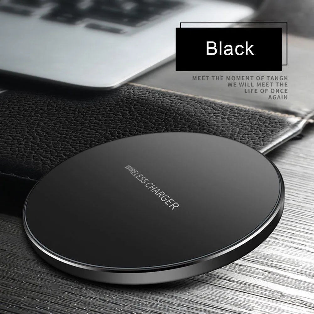Black square GY-68 ultra-thin wireless fast charging pad on a desk.