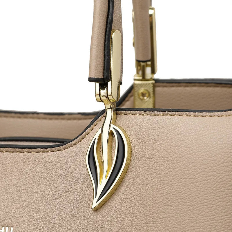 Black women's multi-layer shoulder messenger bag made from PU leather with sewing thread detail.