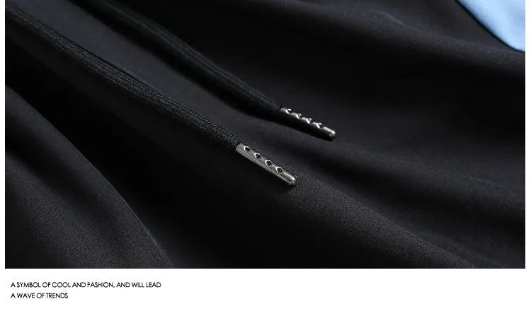 Black loose-fit quick-dry sports shorts with an elastic waistband on a manikin.