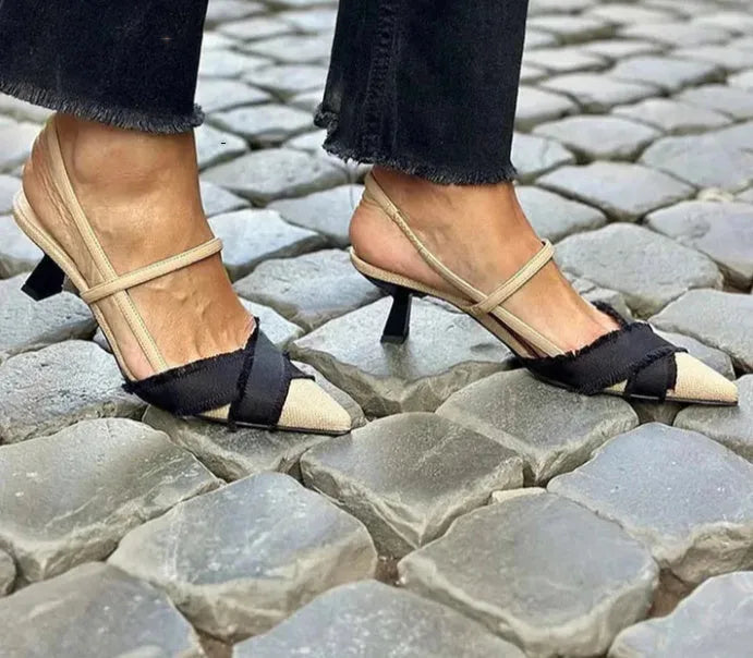 Apricot black colour block women's stiletto heel sandals with pointed toe and ankle buckle.