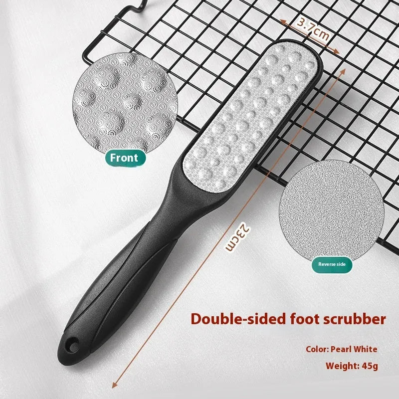 Stainless steel double-sided foot grinder with white and black abrasive heads for callus removal