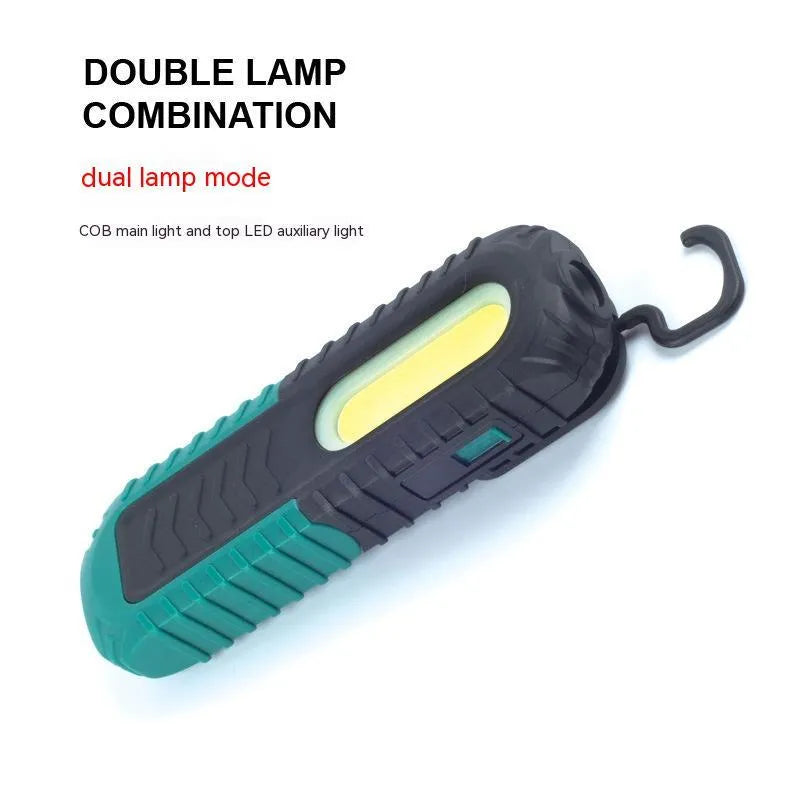 Black and green USB auto repair work light with PET-coated ABS plastic construction