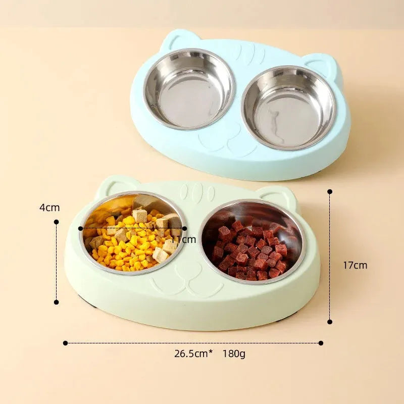 Blue macaron-shaped plastic pet feeder tray with two bowls for food and water.