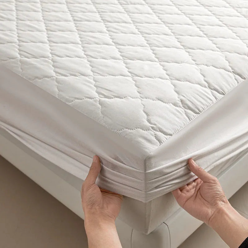 Diamond lattice quilted waterproof mattress protector set in bamboo fibre with fitted sheet and pillowcases