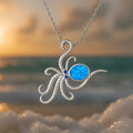 Geometric octopus pendant necklace with inlaid opal centre on silver stainless steel chain