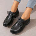 Black women's professional work shoes with thick chunky heel and low-top design