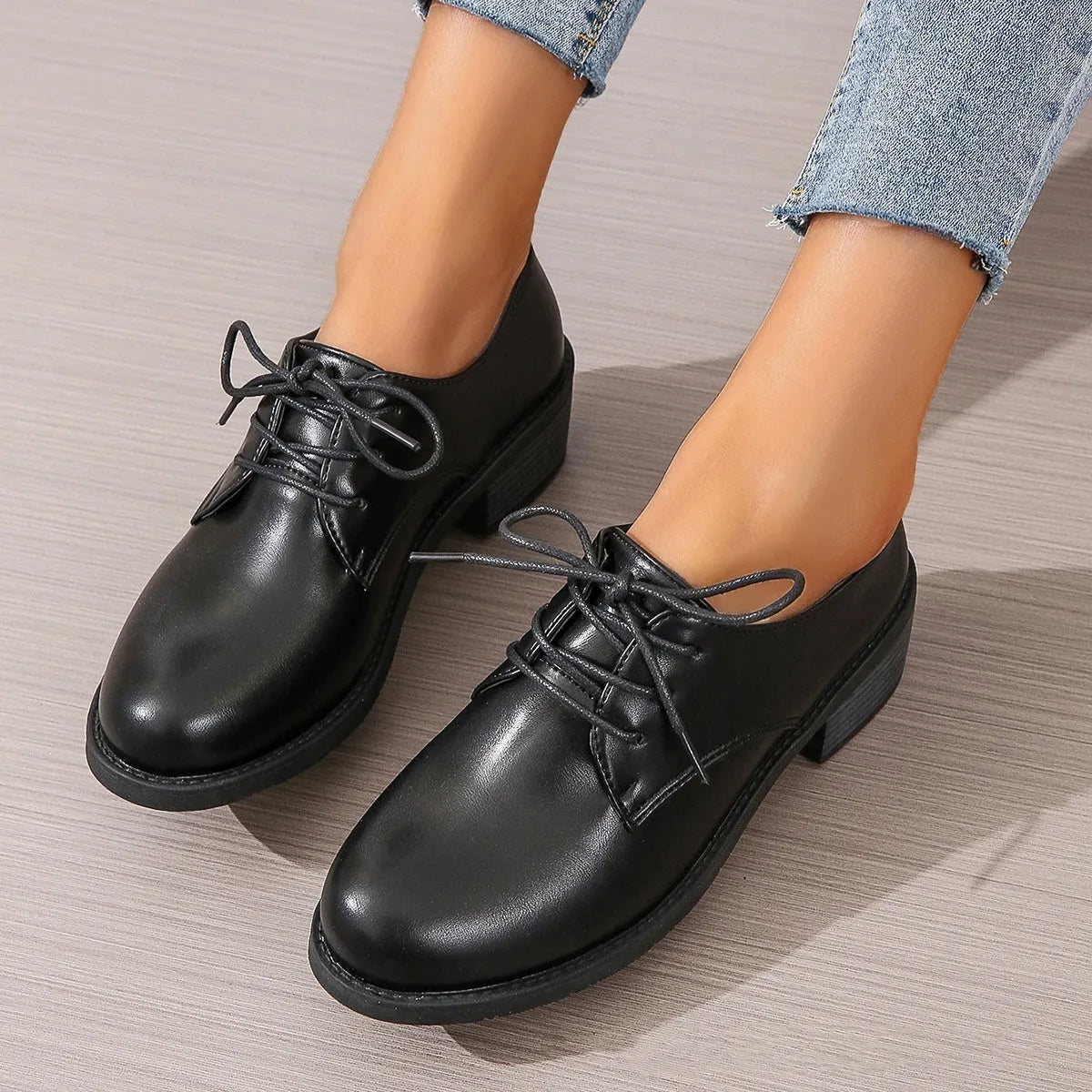 Black women's professional work shoes with thick chunky heel and low-top design