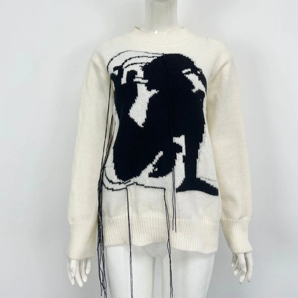 Women's loose grey alpaca wool sweater with tassel design and abstract pattern