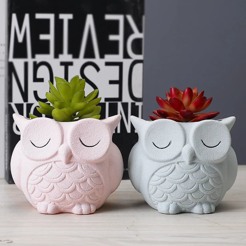 Handmade frosted ceramic owl design succulent flower pot in light pink colour.