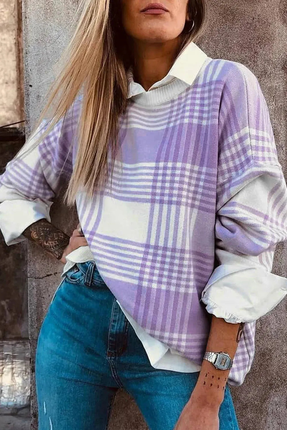Lilac plaid print loose-fitting long sleeve women's sweater with ribbed trim detail.