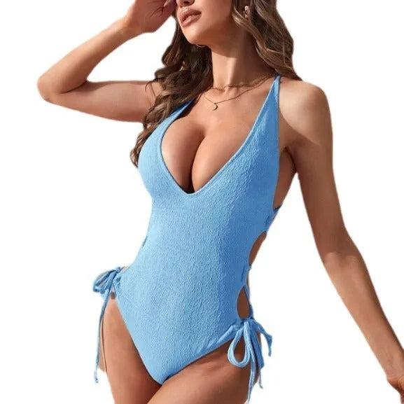 Women's solid colour hollow backless tether bikini swimsuit in black, light blue, yellow, or green.