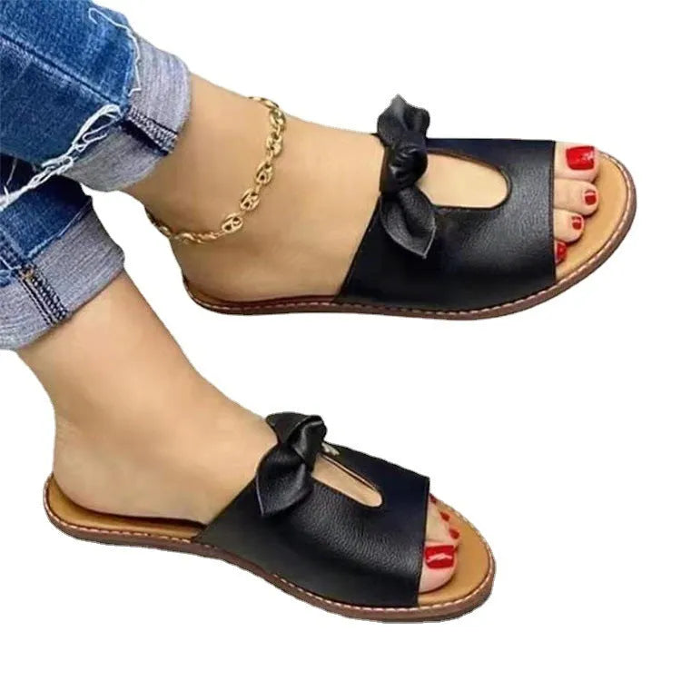 Ladies casual sandals with fish mouth open toe and bow detail in black, pink or gold