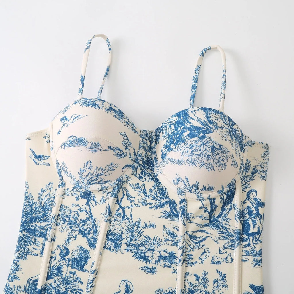 Blue one-piece swimsuit for women with an optional matching gauze skirt, shown in various sizes.