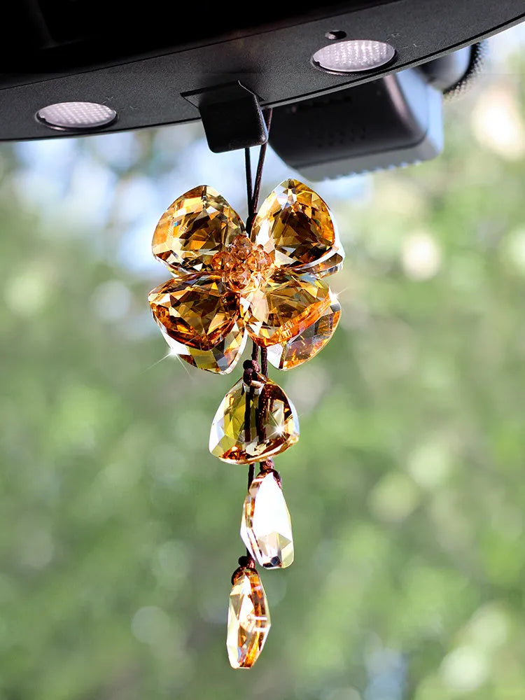 Crystal four leaf grass car pendant in four colour options hanging from rearview mirror