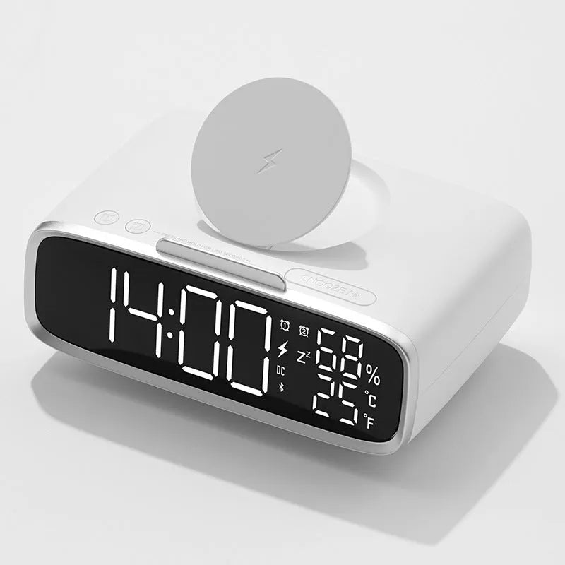 White wireless charger with Bluetooth speaker and night light on bedside table