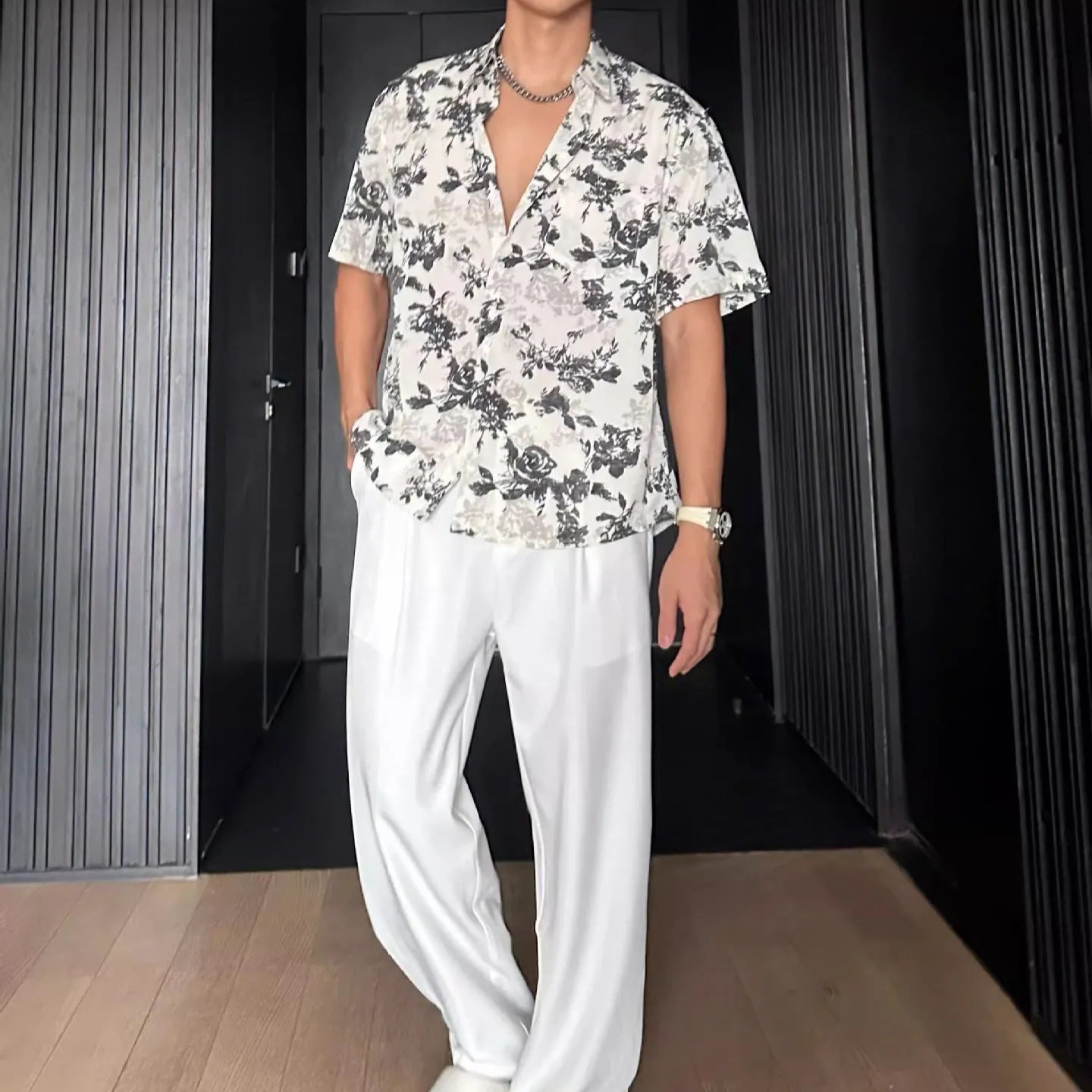 Loose fit floral printed short sleeve shirt in white or black with pendant-style front