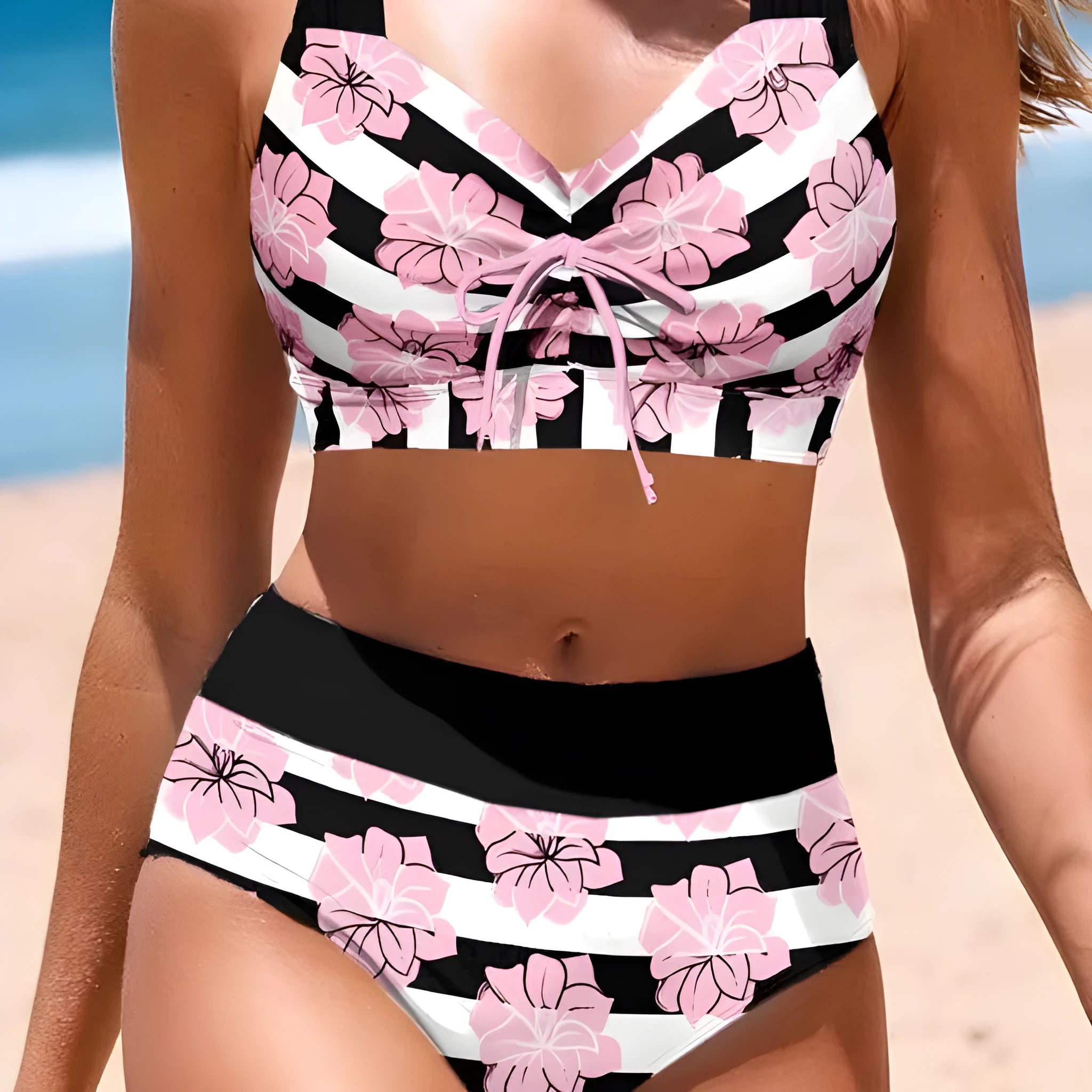 Black women's printed bikini set with belly-covered slimming design for swimming.