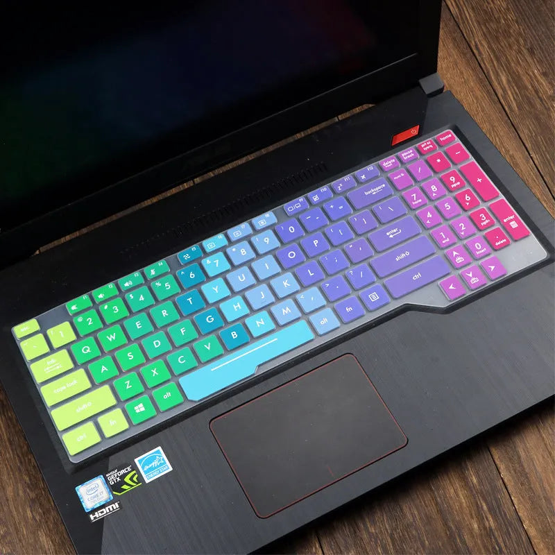 ASUS VivoBook 15 X513 laptop with a translucent mint coloured silicone keyboard protector fitted.