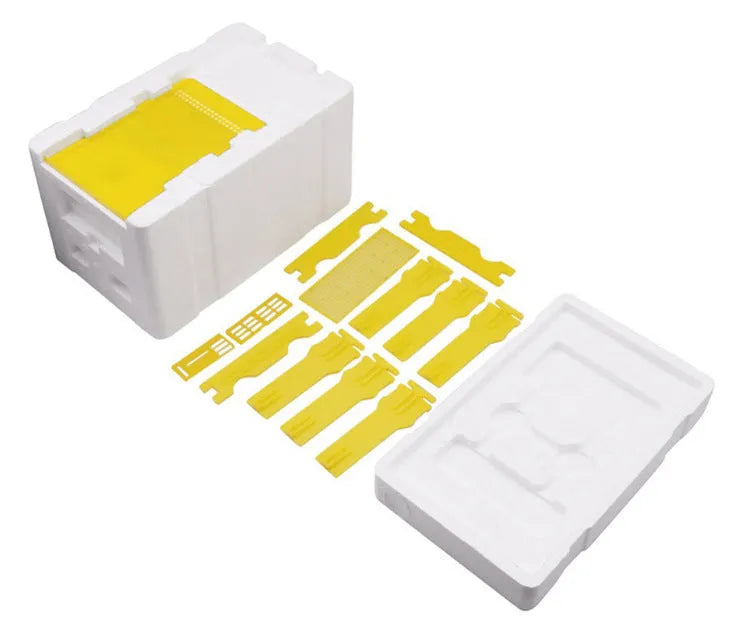 Three white EPS foam bee delivery boxes for beehive transport and colony management