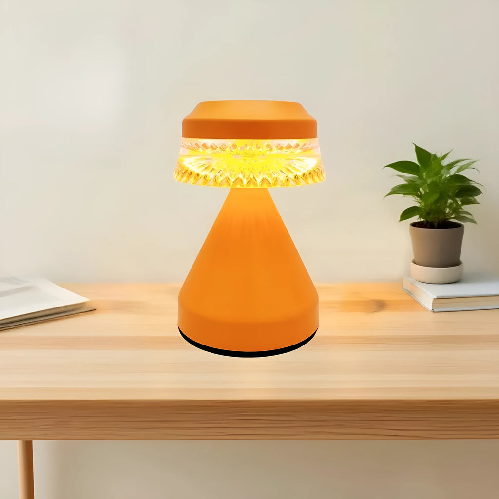 Creative small LED night lamp in black, brown, or orange with USB charging cable.