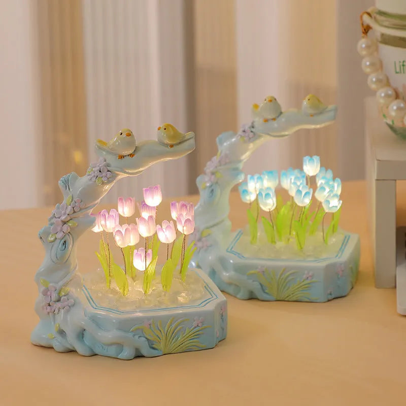 Resin tulip-shaped decorative night light assembled from DIY material package on a desk.