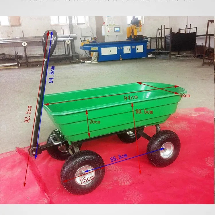Green four-wheel plastic dump truck with steel reinforcement and dump mechanism for agricultural material transport