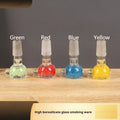 Coloured glass trumpet-shaped tobacco pipe measuring 7cm in blue, green, red, and yellow colour options