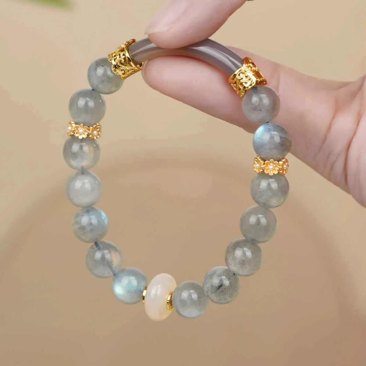Emerald green Tian Shan Cui stone women's bracelet with floating floral motif and circular pattern
