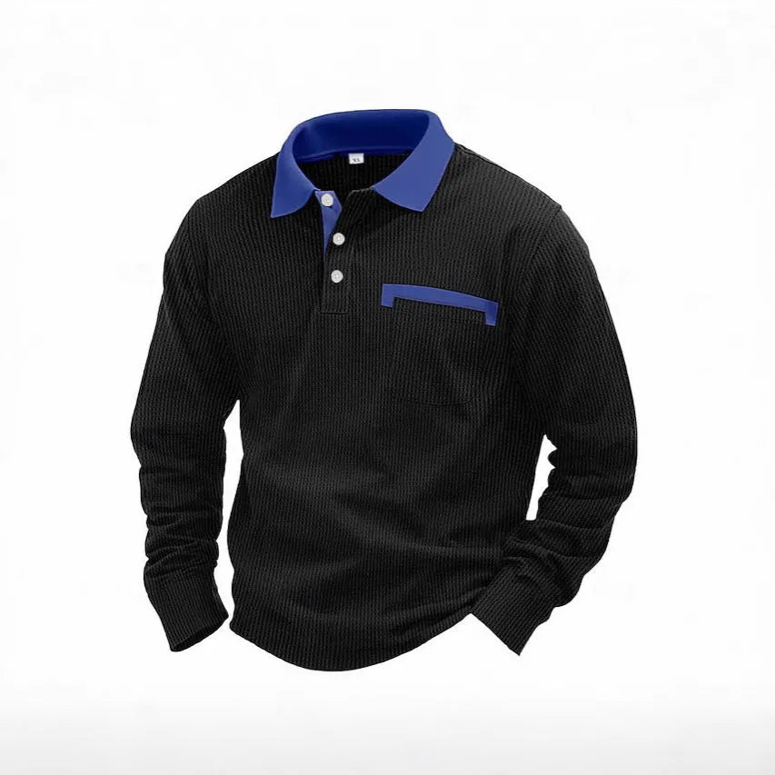 Man wearing a long-sleeved waffle-knit polo shirt in an asymmetric design, shown in a solid colour.