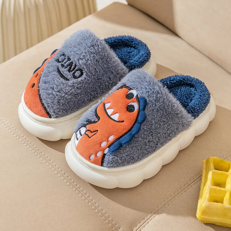 Cotton plush dinosaur print couple slippers in gray, coffee, and orange colours on a white background.