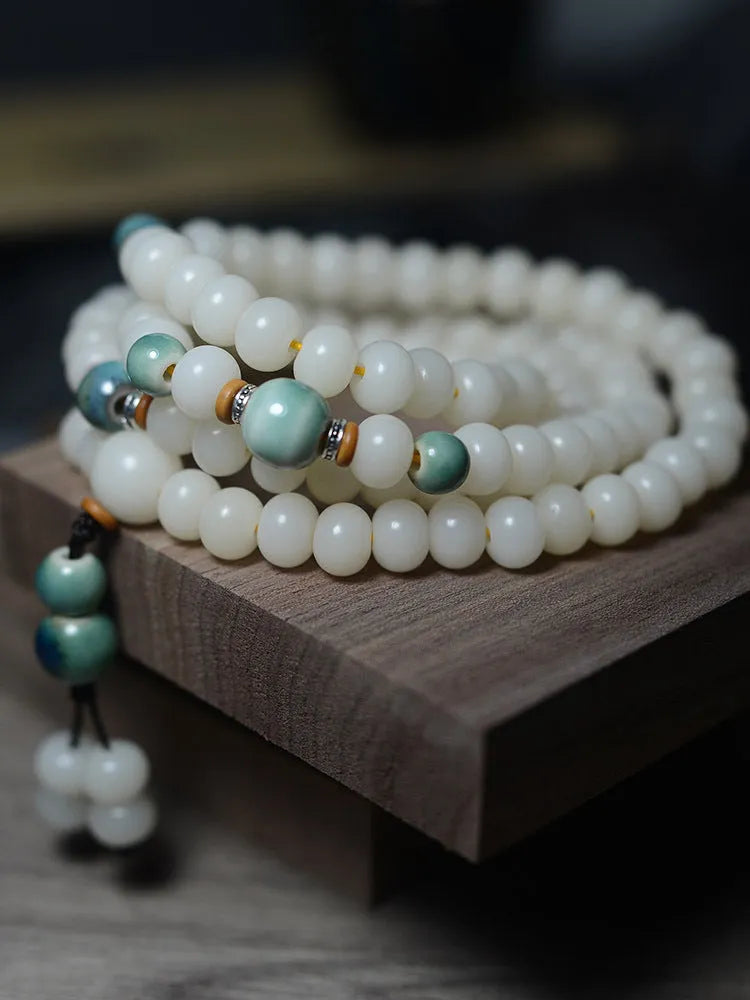 White jade bodhi root bracelet with 108 flat round beads in unisex national style.