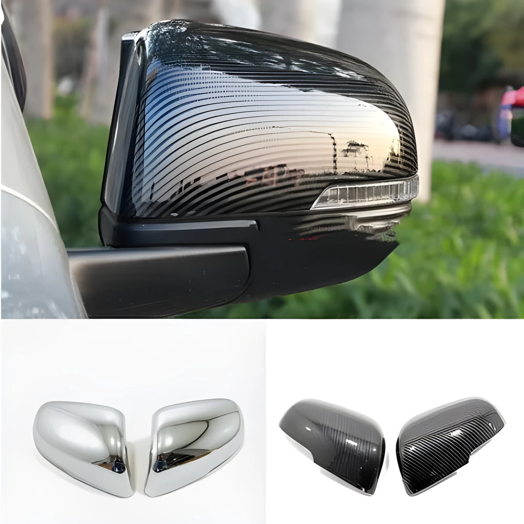 Pair of plastic rearview mirror covers in silver and black finishes for car styling.