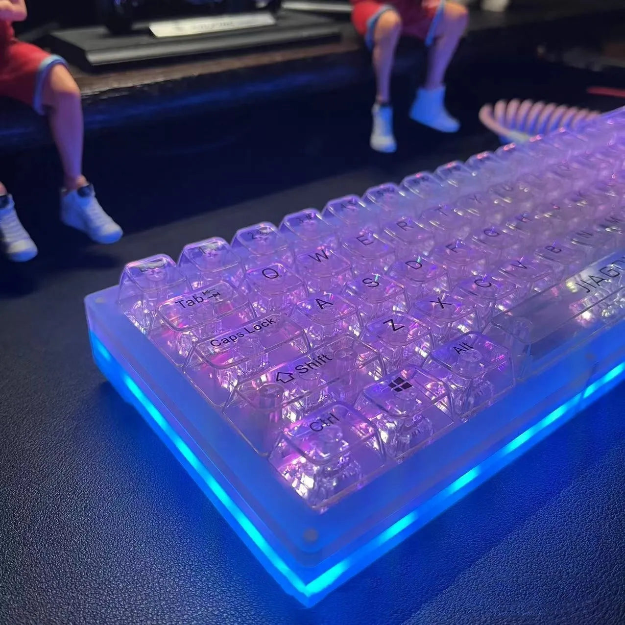 Universal transparent plastic 132-key mechanical keyboard key cap set laid out.
