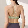 Women's sports vest in nylon with fixed double-shoulder straps for running and workouts.